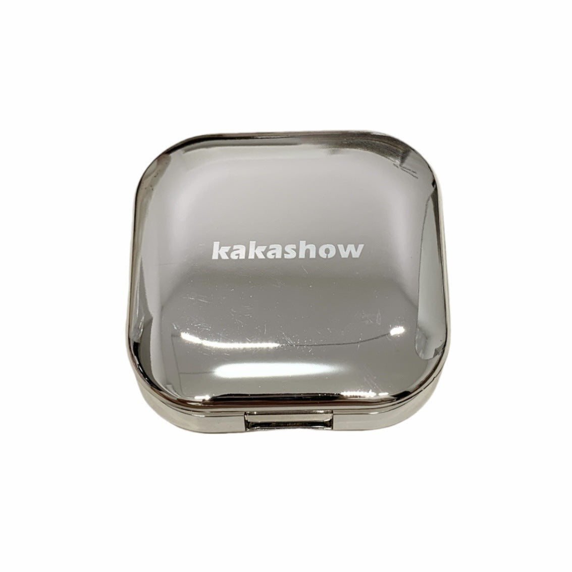 Define, sculpt, and illuminate in two simple steps with the Kakashow Dual Contour &amp; Highlighter Palette. Designed for both professional makeup artists and everyday beauty routines, this travel-friendly compact pairs an ultra-blendable shading powder with a micro-fine pearlescent highlighter to effortlessly carve facial features and deliver a soft-focus radiant glow.